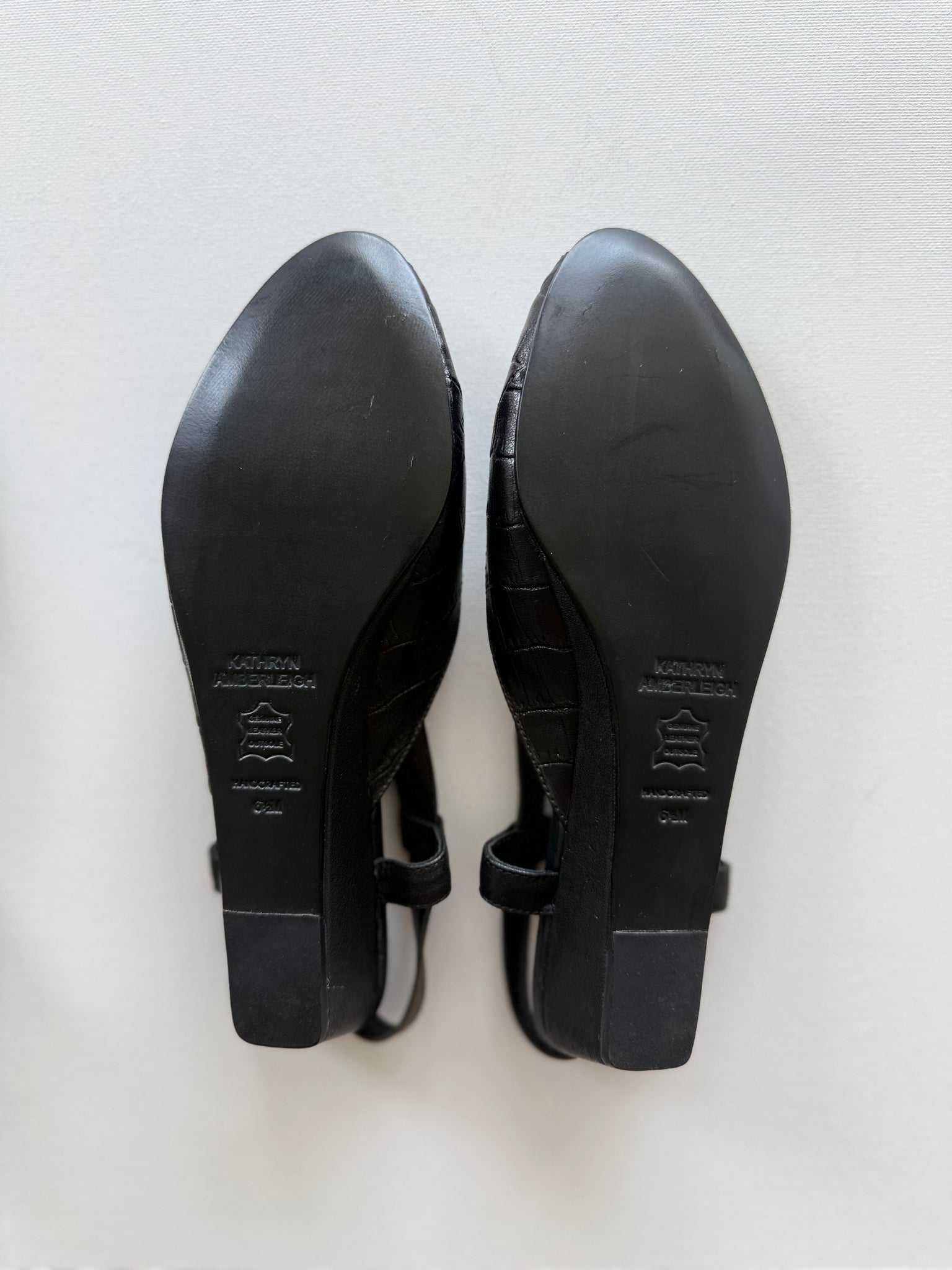 J005 alligator and lamb slingbacks; ebony and olive