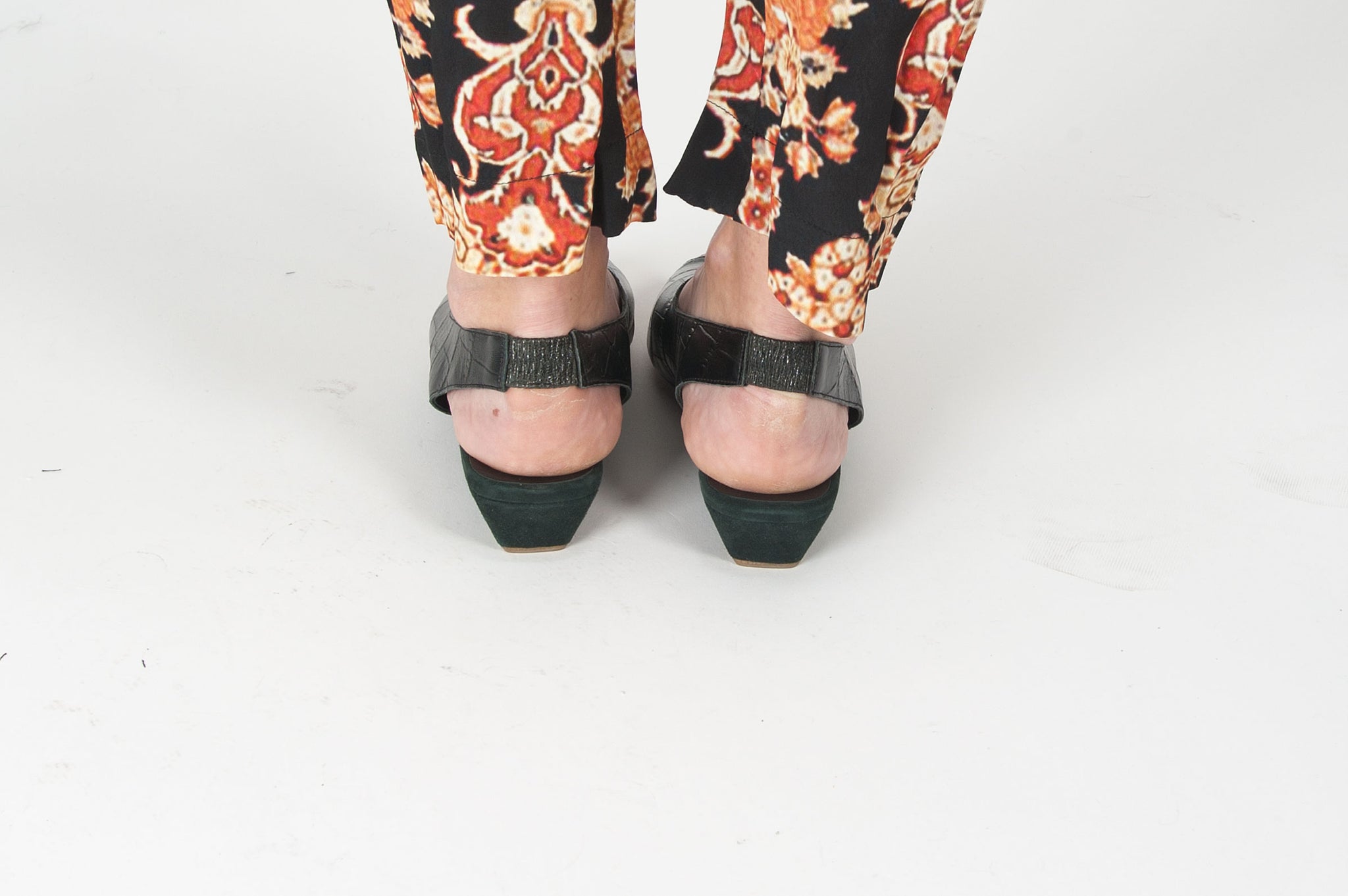 K414 leather slingbacks; black croc