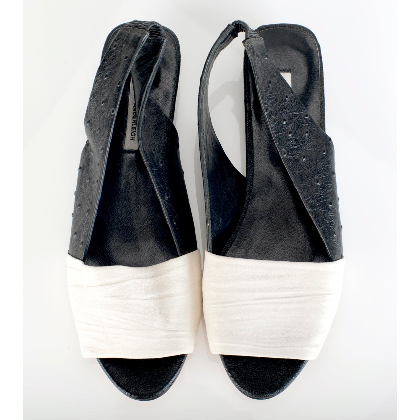 K432 leather slingbacks; white and black ostrich