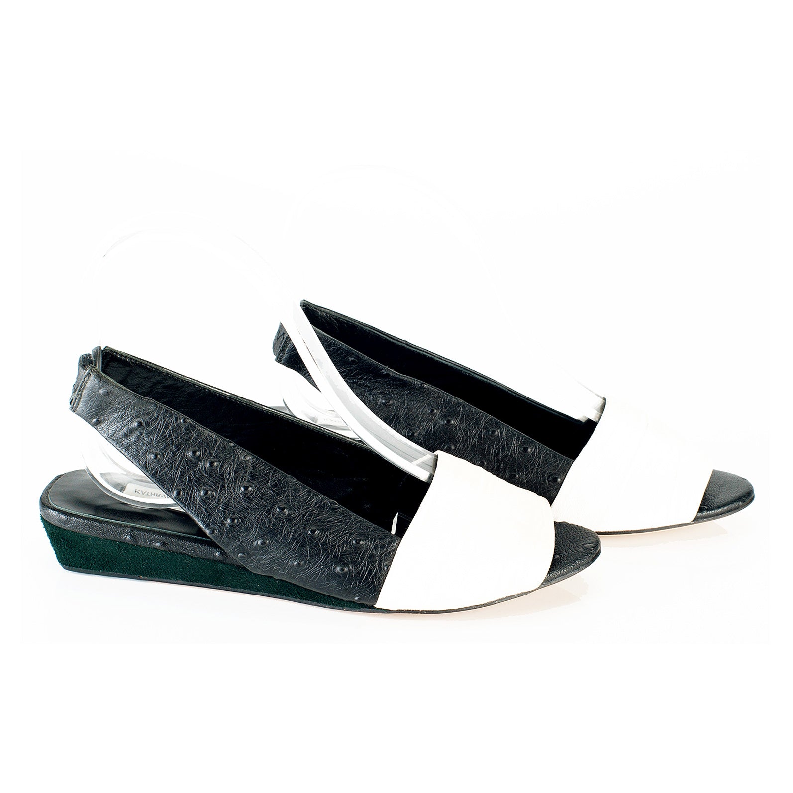 K432 leather slingbacks; white and black ostrich