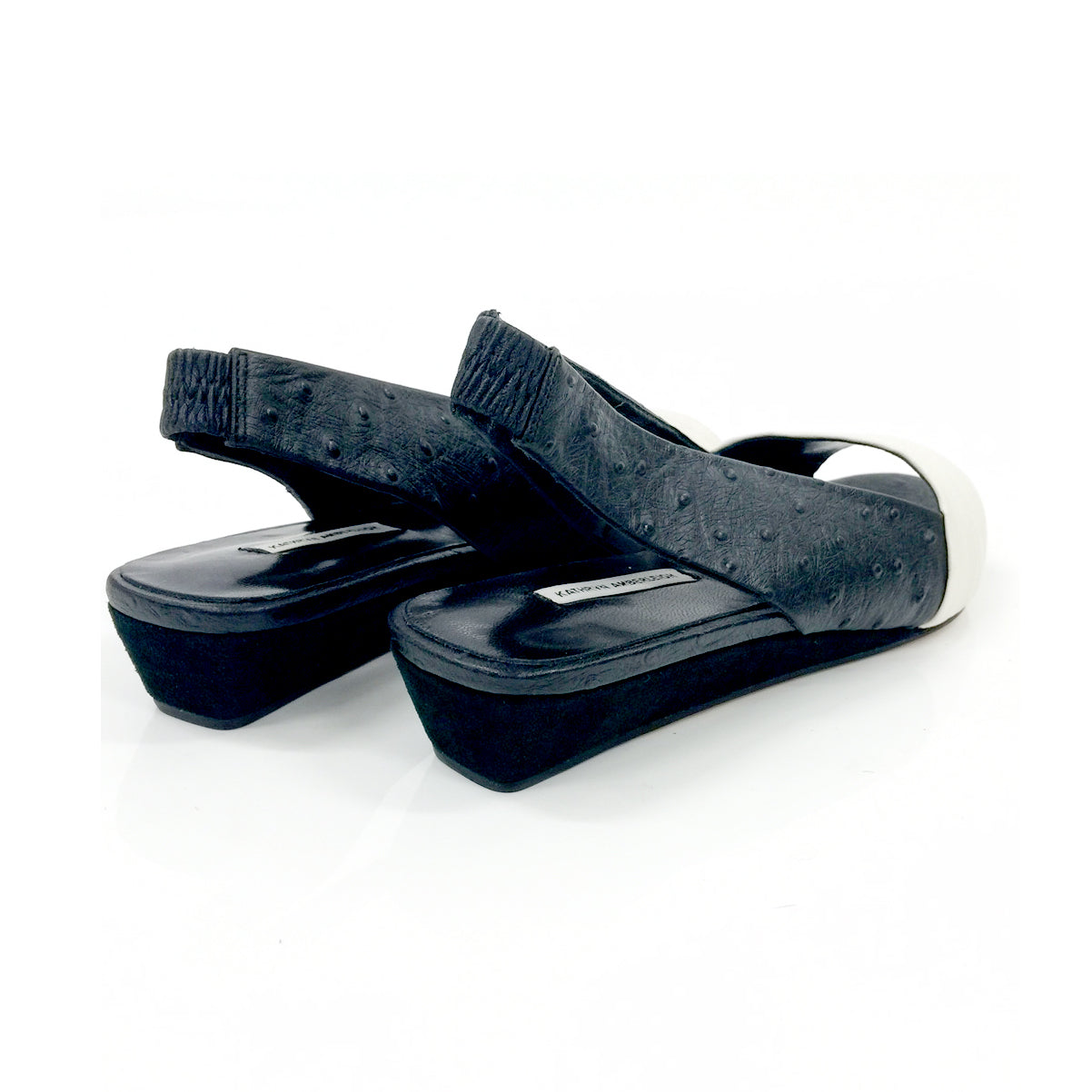 K432 leather slingbacks; white and black ostrich