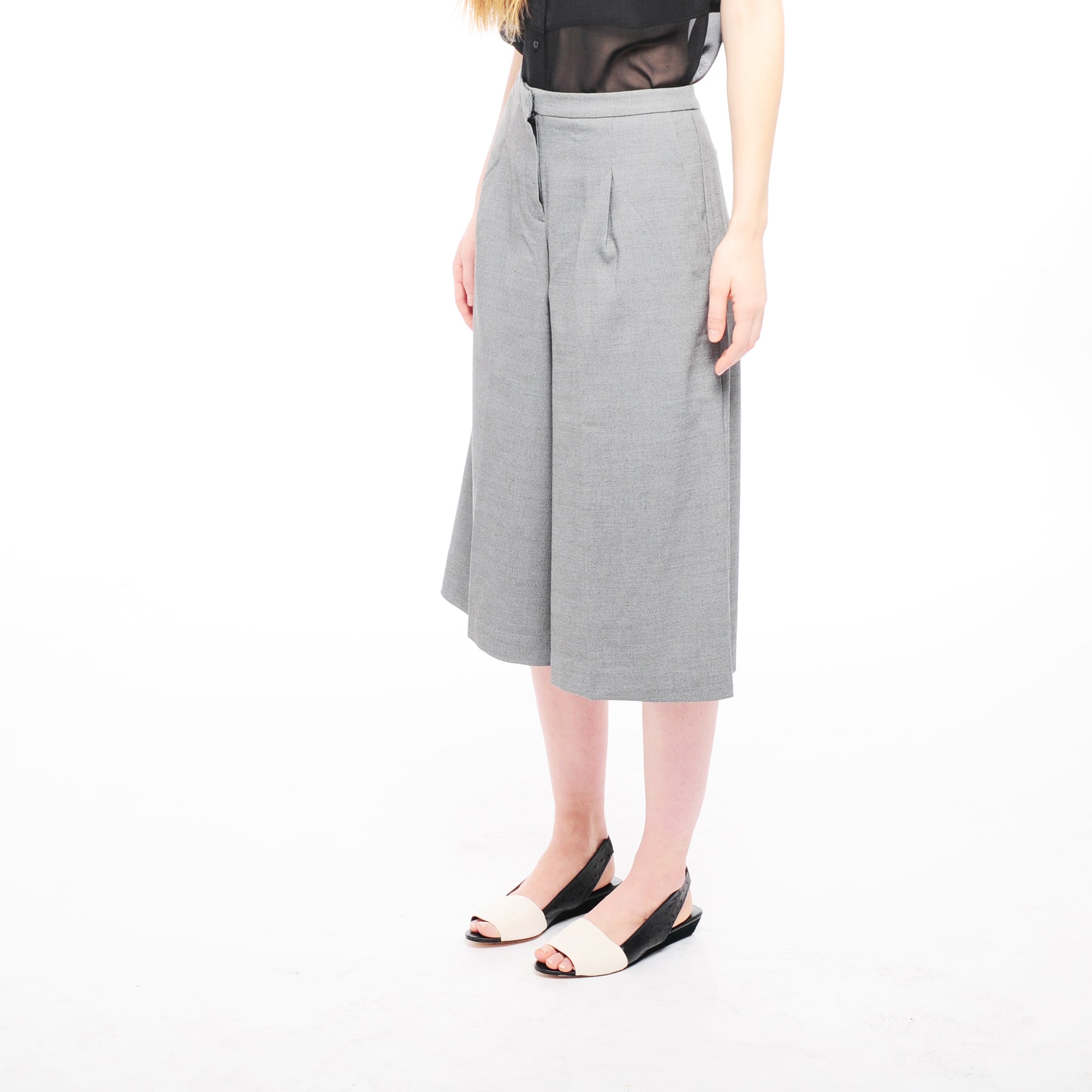 K432 leather slingbacks; white and black ostrich