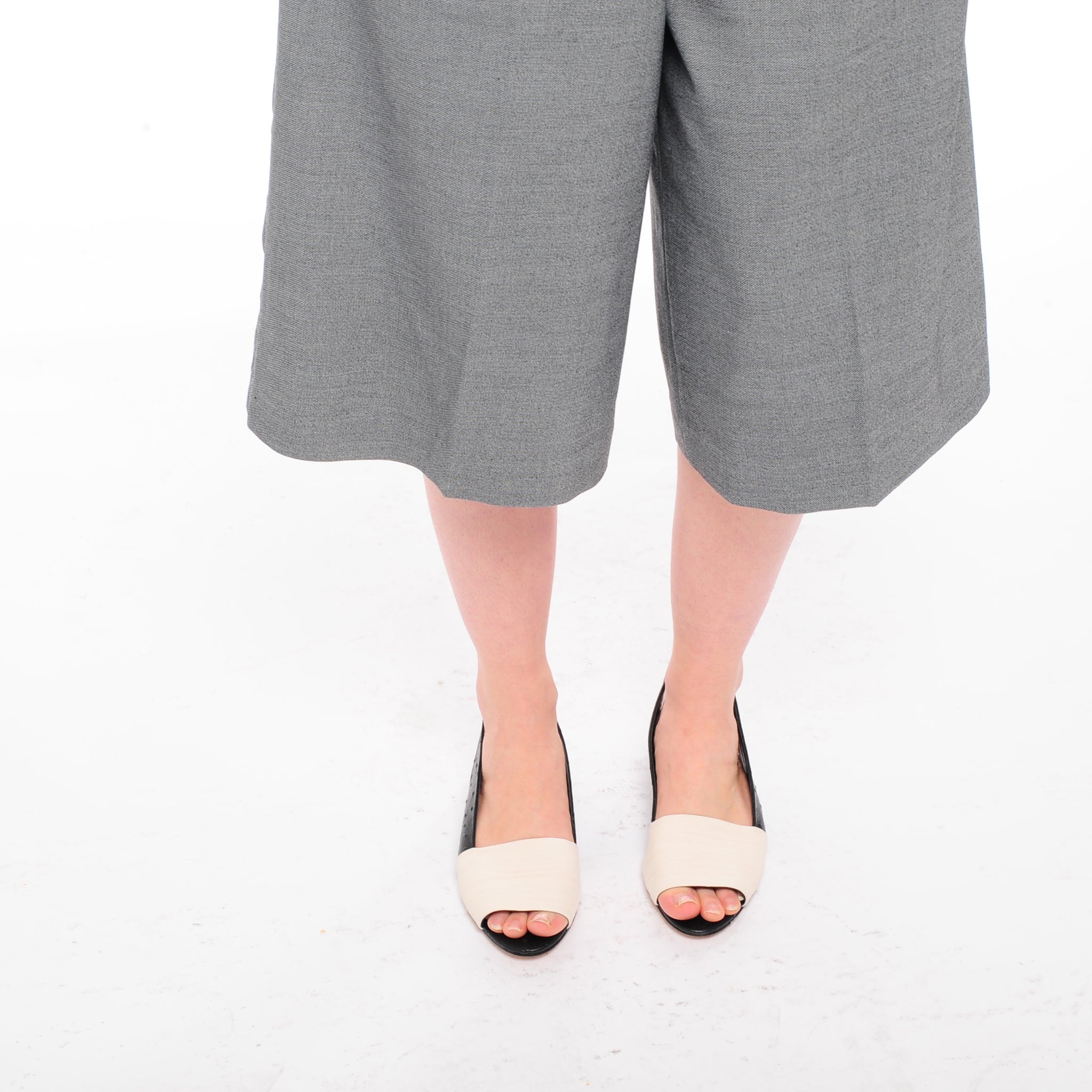 K432 leather slingbacks; white and black ostrich