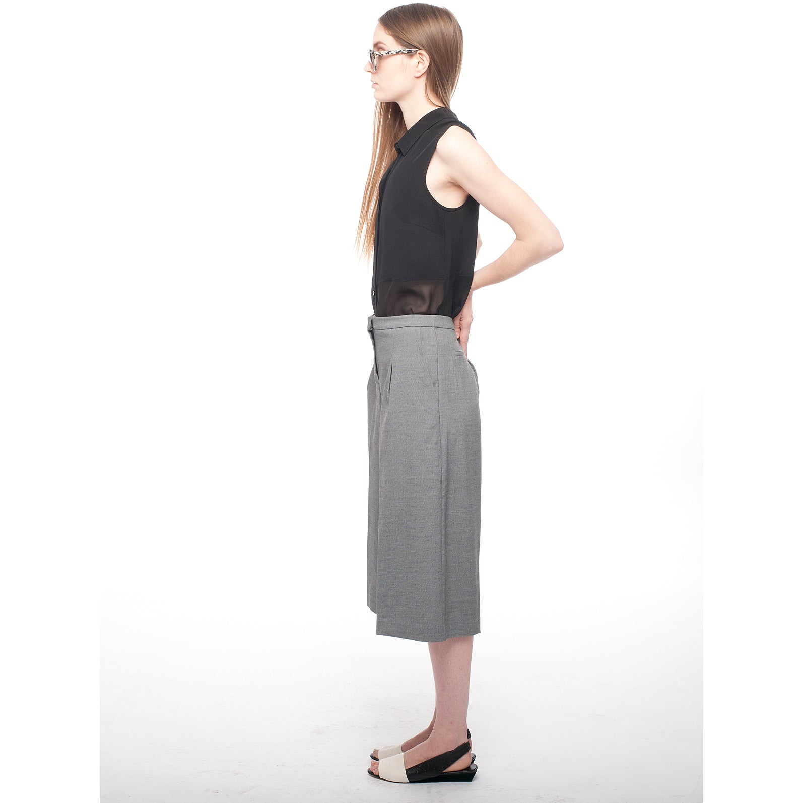 K432 leather slingbacks; white and black ostrich