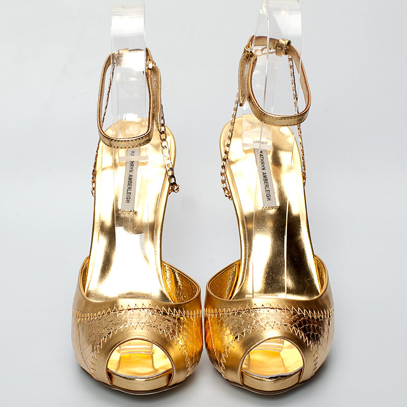 3083 snake skin heels; gold