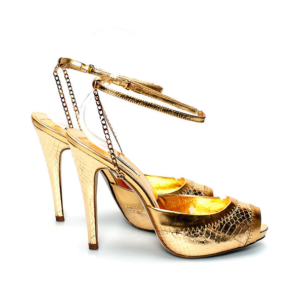 3083 snake skin heels; gold