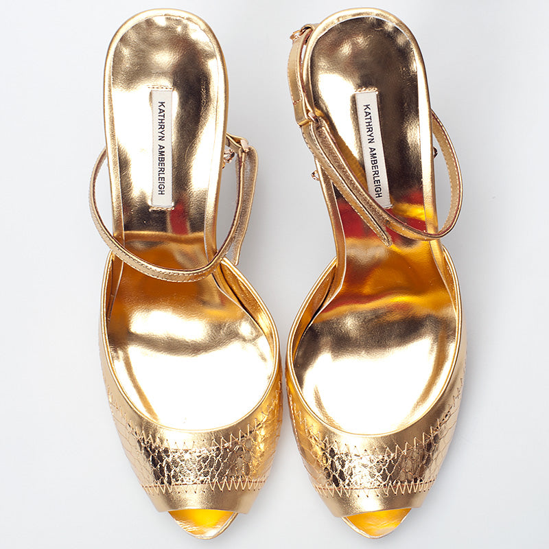 3083 snake skin heels; gold