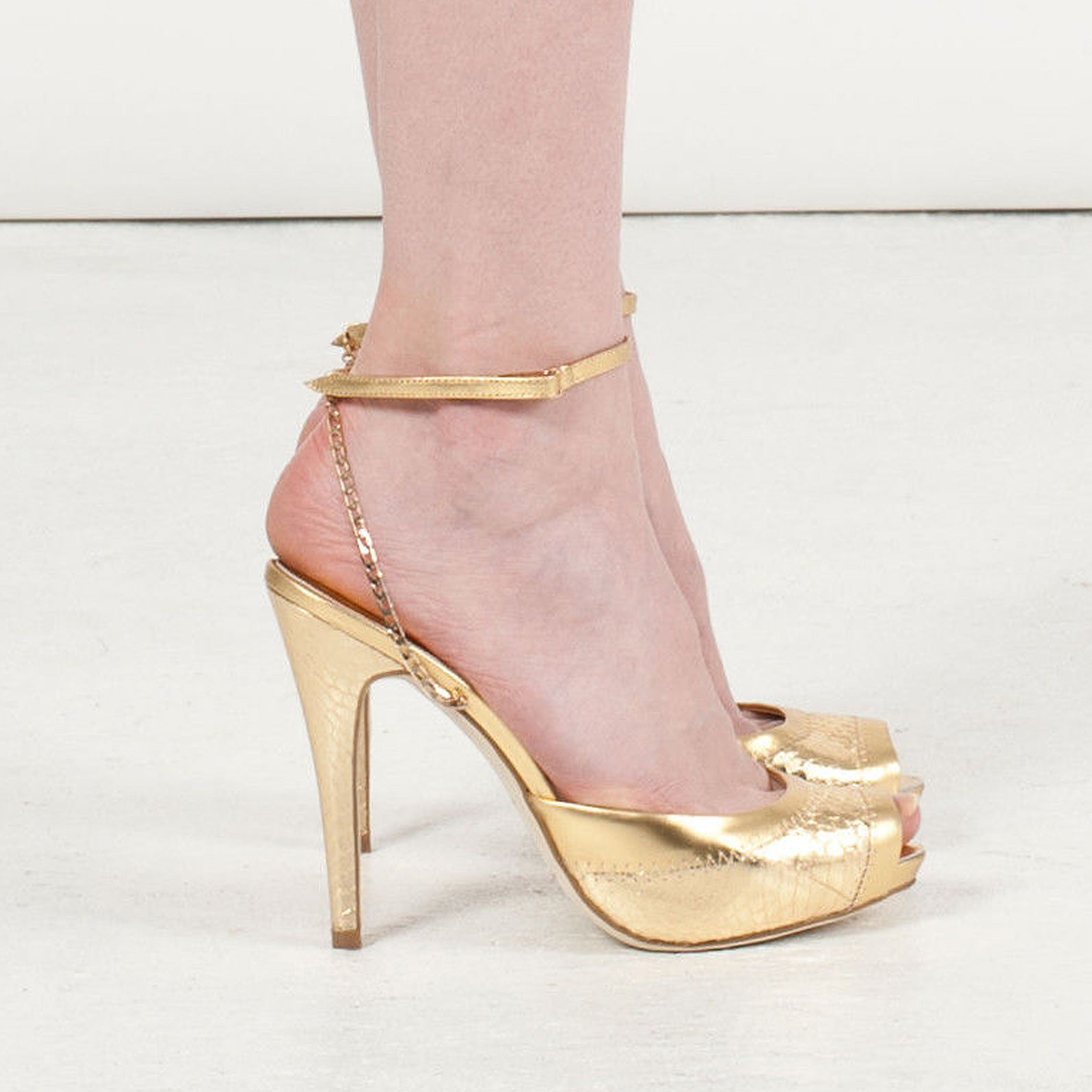 3083 snake skin heels; gold