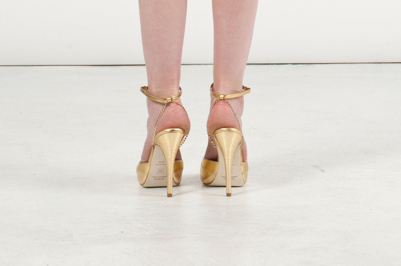3083 snake skin heels; gold
