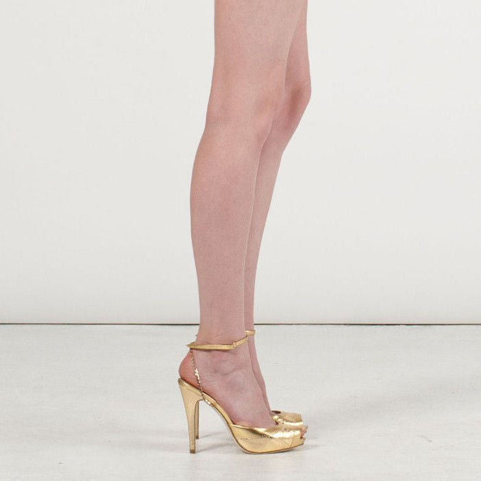 3083 snake skin heels; gold