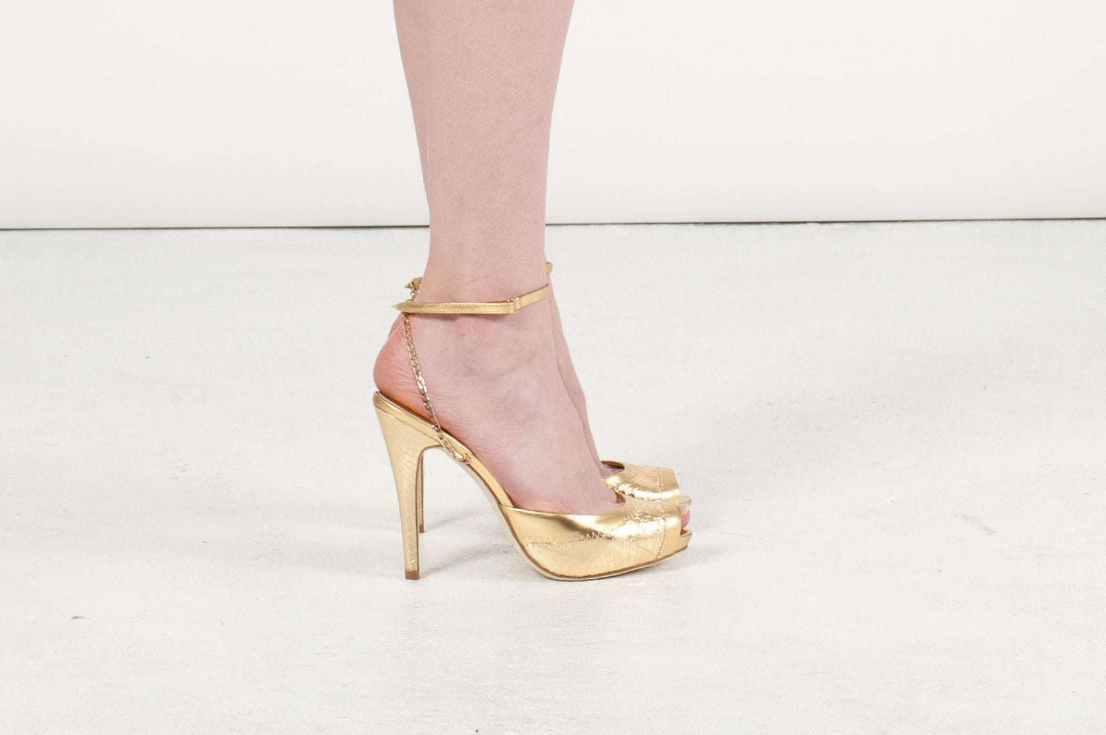 3083 snake skin heels; gold