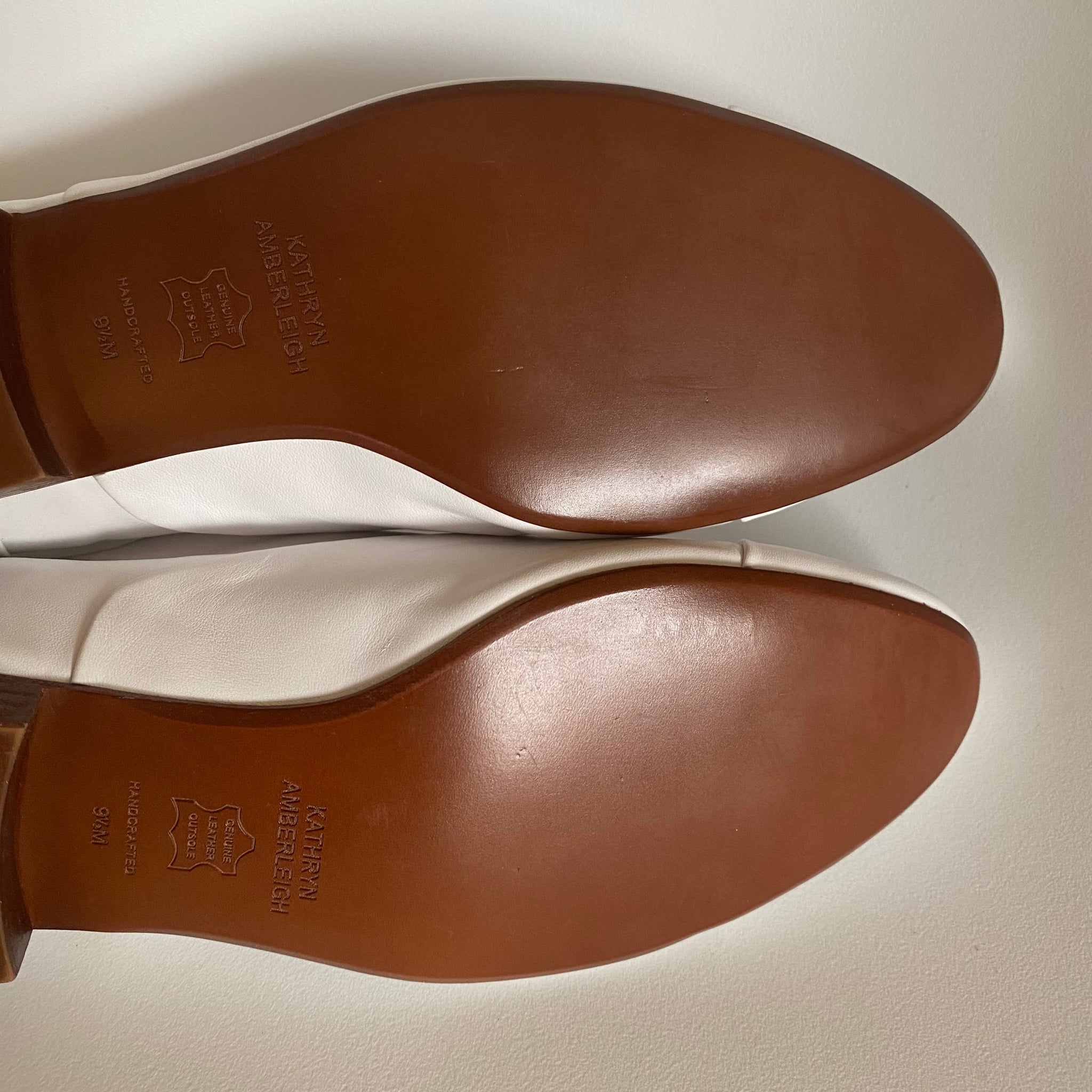 J544 leather loafers; white