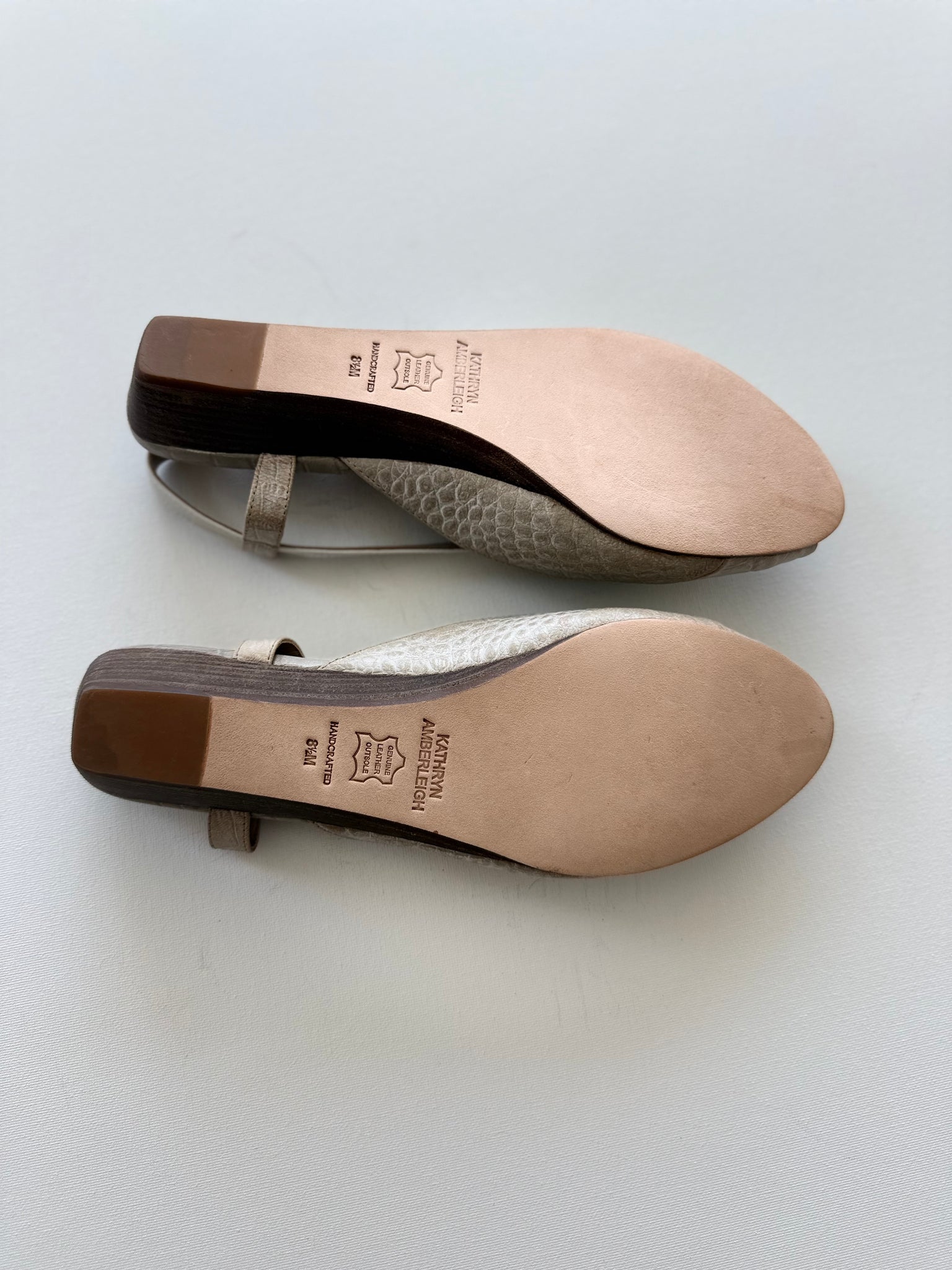 J005 leather slingbacks; nude and white