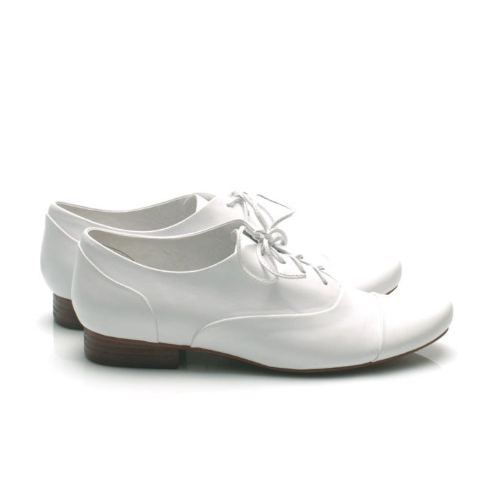 J544 leather loafers; white