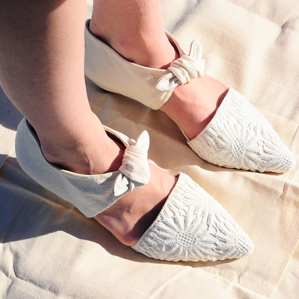 K674 lace and leather pumps; cream