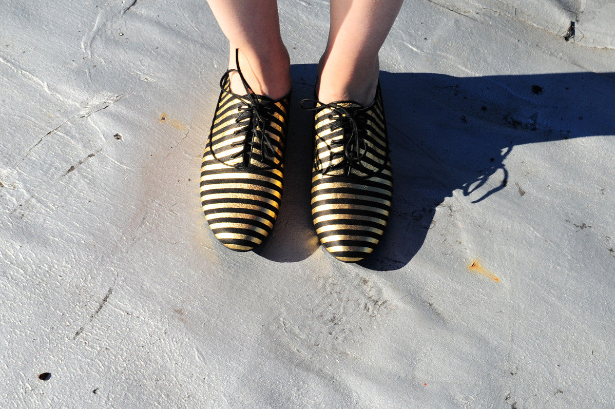 K436 leather loafers; gold and black
