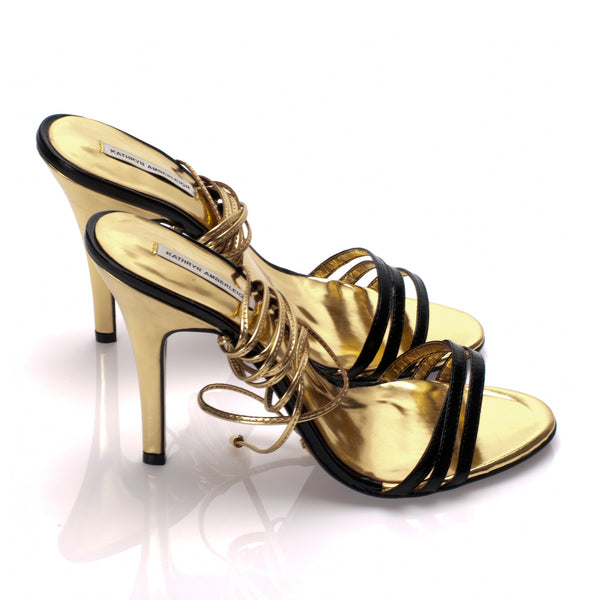 3071 patent leather heels; black and gold