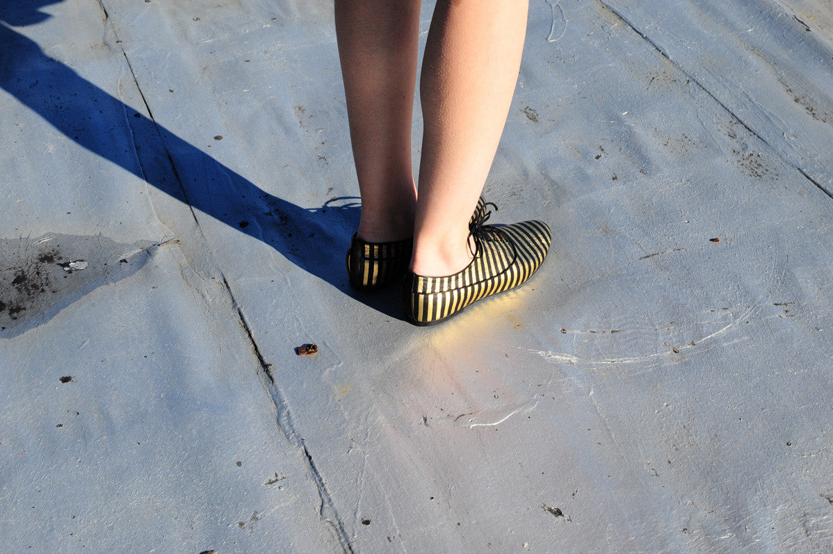 K436 leather loafers; gold and black