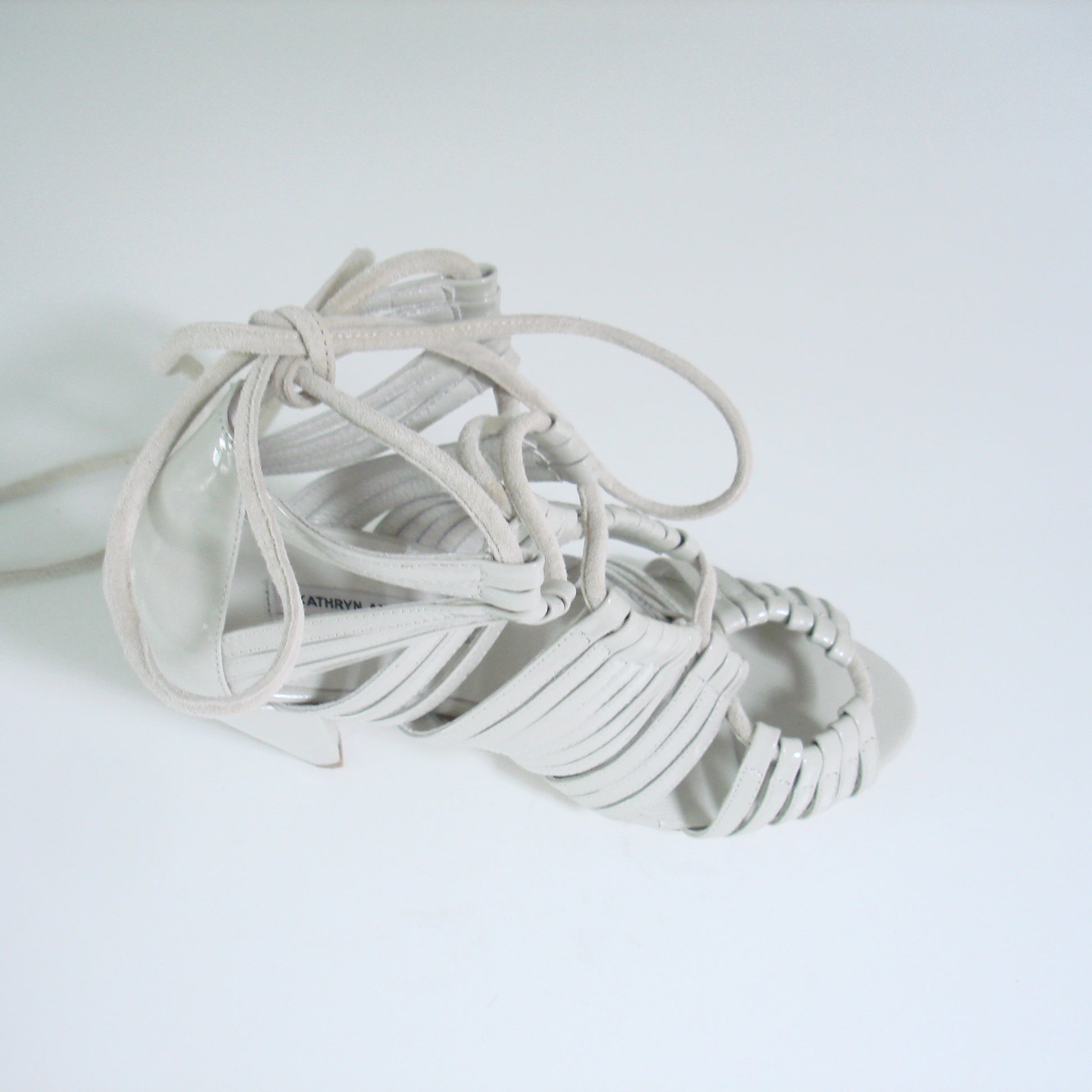 J013 patent leather heels; stone
