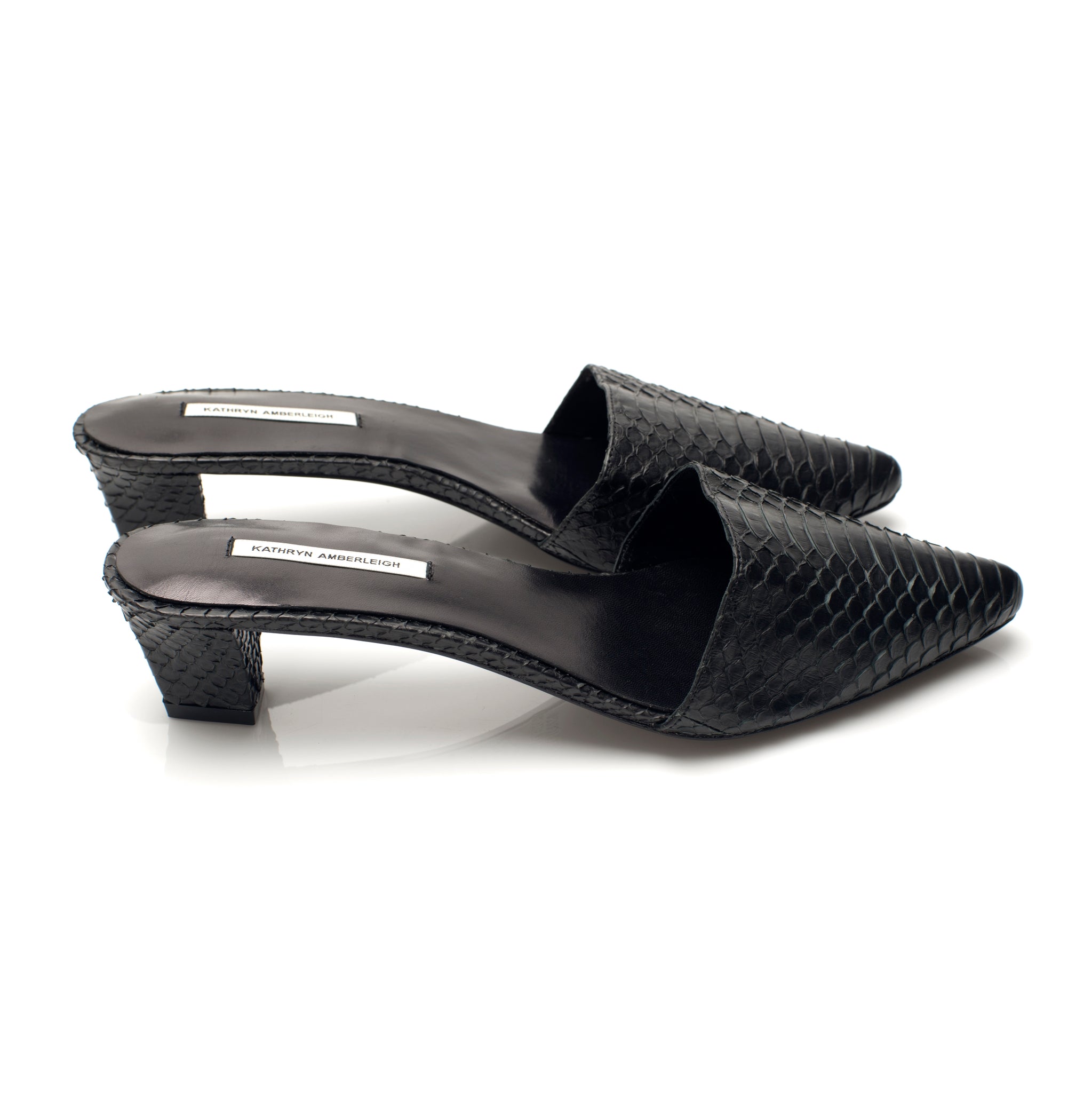 K606 snakeskin mules; noir