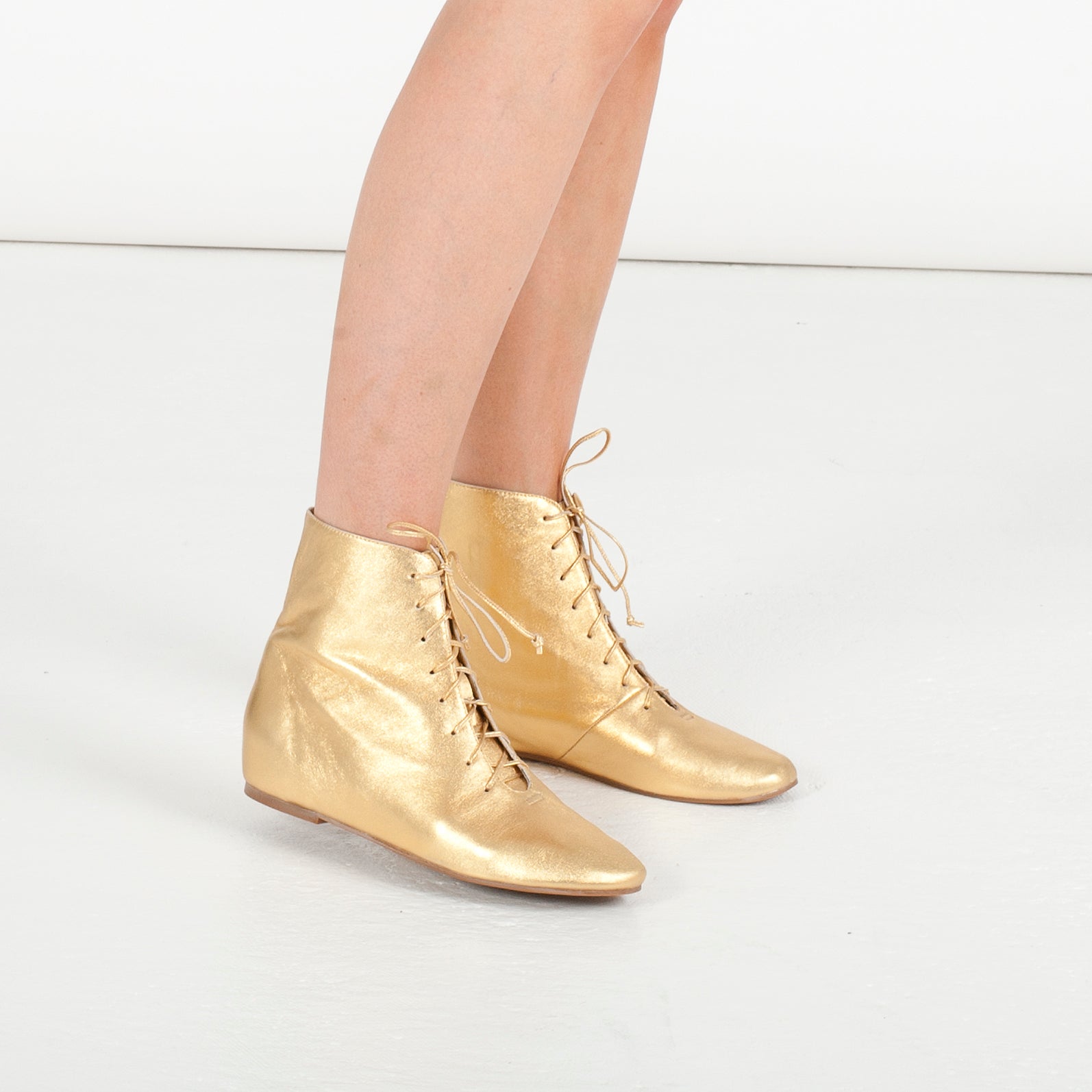 J117 leather boots; retro gold