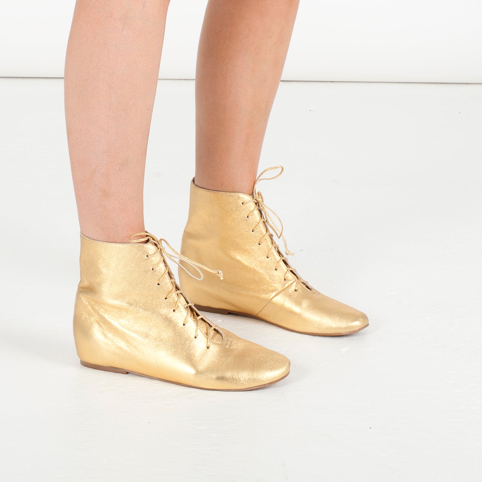 J117 leather boots; retro gold