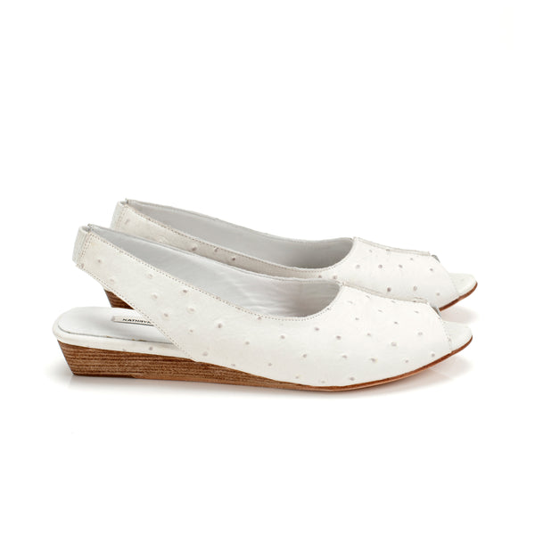 K414 leather slingbacks; white ostrich