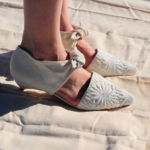K674 lace and leather pumps; cream